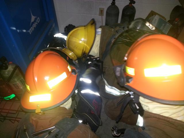 Hooking the RIT pack up to a down firefighter with low air. 10/14/13